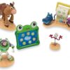 Disney Store Official Toy Story 5 Figure Set –7 Fully Sculpted Disney Figures Including Woody, Buzz, Forky, Lilypad, Bullseye, Jessie & Tech Trio...