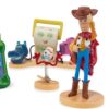 Disney Store Official Toy Story 5 Figure Set –7 Fully Sculpted Disney Figures Including Woody, Buzz, Forky, Lilypad, Bullseye, Jessie & Tech Trio...